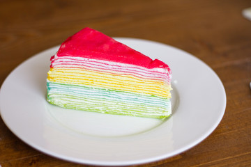 Colourful crape cake  strawberry on white dish