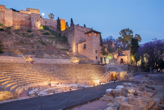 Malaga - The Ruins of Rome amfiteater (Anfiteatro de Malaga) at dusk