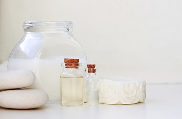 white household cosmetic products bottles jars white background