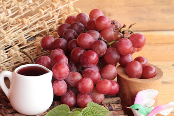 Bunch of grapes fruit  juicy fresh delicious and red wine.