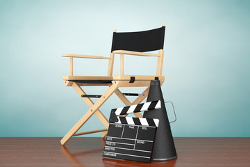 Naklejka premium Old Style Photo. Director Chair, Movie Clapper and Megaphone