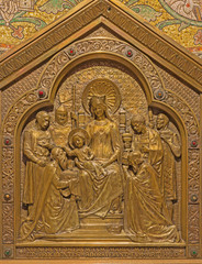 Fototapeta na wymiar Jerusalem - relief of Madonna among the saint in side apse of Dormition abbey