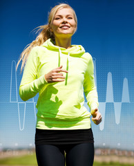smiling woman jogging outdoors