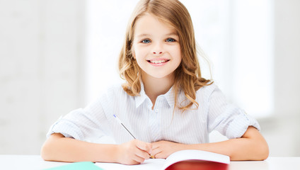 student girl studying at school