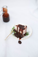 Vanilla Ice Cream Cake with Brownies and Chocolate Fudge Sauce