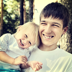 Young Man and Child Boy