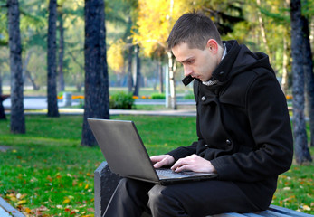 Young Man with Laptop