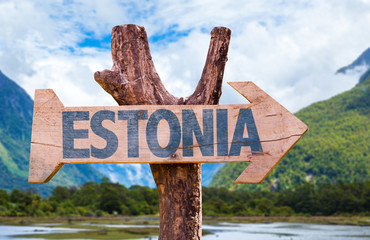 Estonia wooden sign with landscape on background