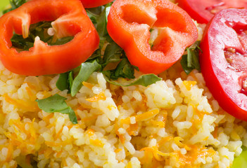 Rice with vegetables and rucola