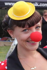 A lady dressed as a funny clown