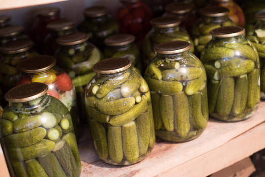 Pickled Cucumbers in Jars in the Cellar