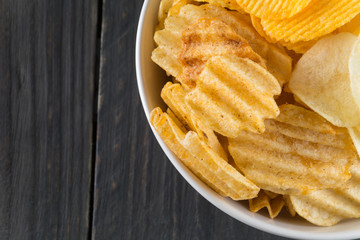 potato chips on wood background