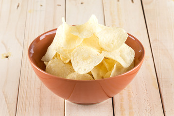 potato chips on wood background
