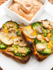 Toasts with broccoli and mushrooms