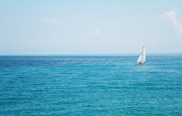 Sailboat, sea, sun, blue, sea, horizon, ocean. Summer holiday, postcard background