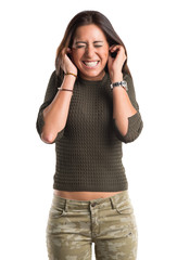 woman covering her ears