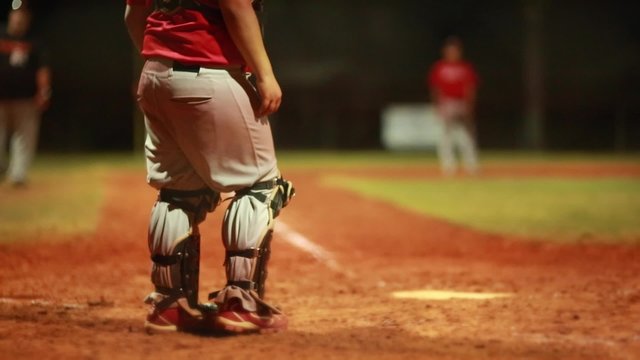 Catcher throwing a ball during a baseball game 