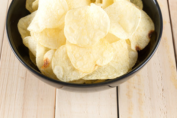 potato chips on wood background