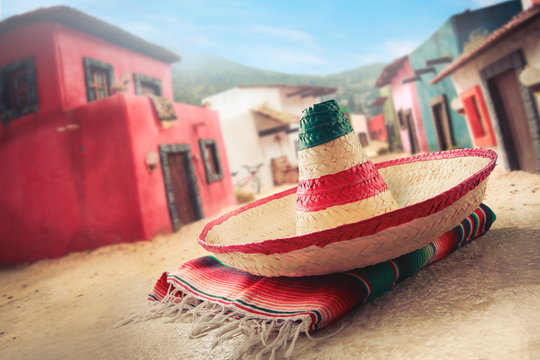 Mexican hat "sombrero" on a "serape" in a mexican village