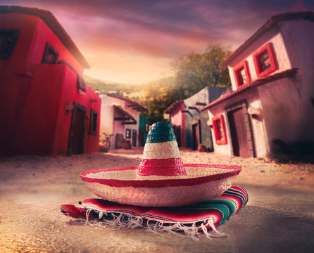 Mexican hat "sombrero" on a "serape" in a mexican village at sun