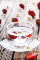 Strawberry drink in a glass with ice.Detox water.selective focus.