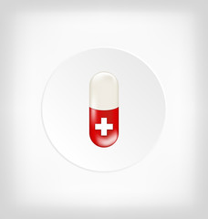 Red capsule pill with medical cross