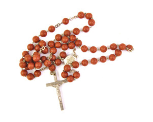 wooden rosary with a cross on white background