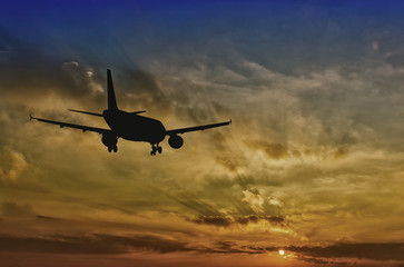 Naklejka na ściany i meble Beautiful view of silhouette of airplane