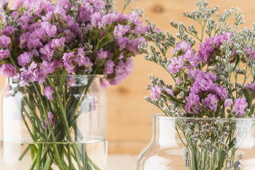statice flower bouquet  on wood background