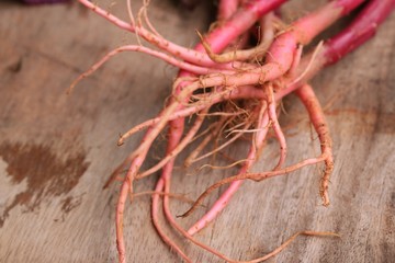 red spinach on a wooden vintage