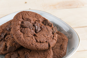 soft dark chocolate brownie cookies on wood