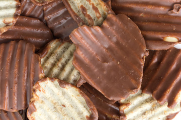 potato chip with chocolate on white