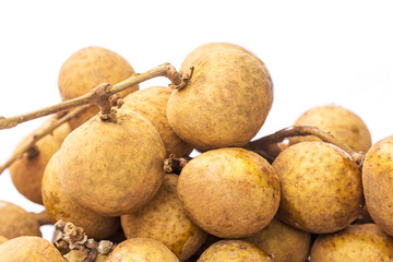 Close up of longan fruit on a white background.