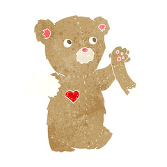 cartoon teddy bear with torn arm