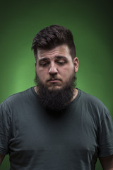 dissatisfied men portrait. Green screen background.