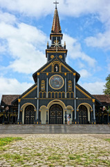 Fototapeta na wymiar Kontum wooden church, ancient cathedral, heritage
