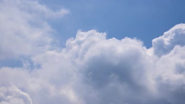 Puffy Clouds Drifting By Time Lapse
