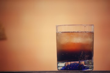 Cola with ice cubes