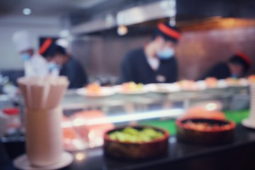 Blurred of japanese chef in restaurant