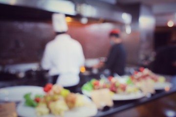 Blurred of chef in restaurant