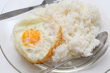 rice and fried eggs of easy breakfast cooking