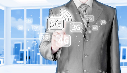 businessman holding in hand 5G, technology background
