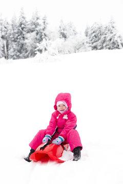 sledding little girl