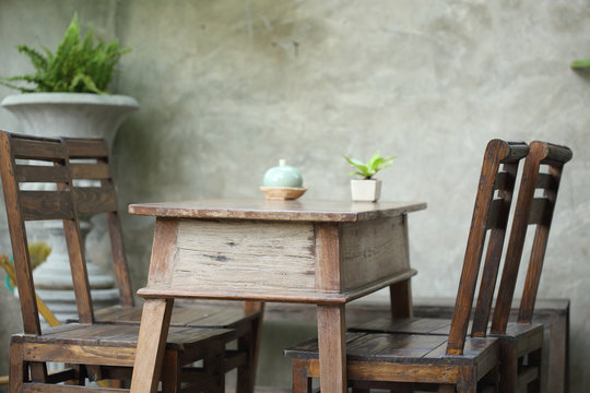 set of wooden table and chair decorated in garden, interior