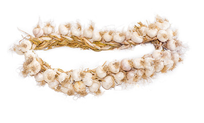 Bundle of garlic on a light background