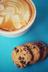 Chocolate chip cookies with latte art coffee