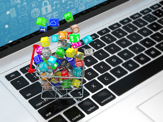 shopping cart with application software icons on laptop