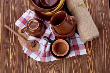 plates and cups on wooden table
