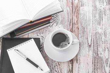 Cup of coffee on a wooden table