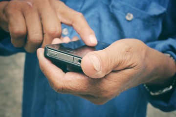 Senior man using smart phone